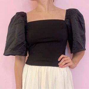 Black top with satin puff sleeves